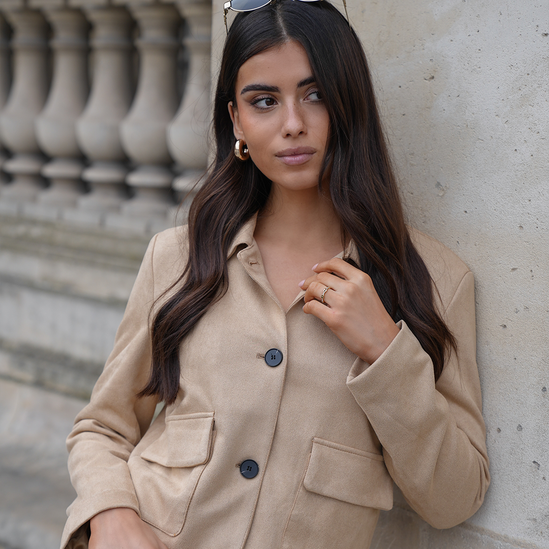 SOERA outerwear styled with a beige jacket